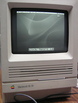 Illustration for article titled Hacker Stuffs a Mac Mini Inside an Apple SE/30